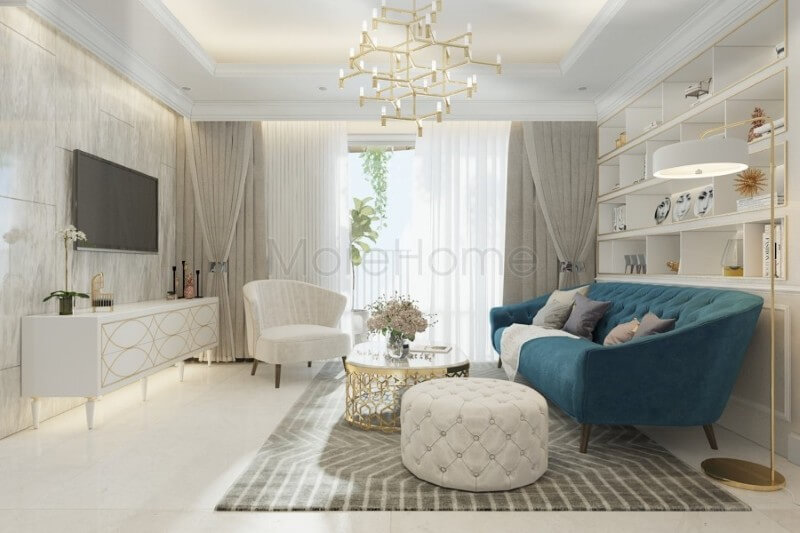 Bộ sofa cao cấp bọc nỉ màu xanh ấn tượng được coi là điểm nhấn sang trọng, tạo sự tươi mới cho không gian phòng khách của gia chủ Mẫu nội thất chung cư đẹp