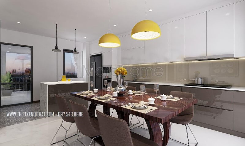 Bộ bàn ghế phòng ăn gỗ nguyên tấm sẫm 6 ghế màu kết hợp cùng tone sáng từ tủ bếp tạo nên vẻ đẹp hài hòa, sang trọng cho phòng bếp hiện đại. Thiết kế phòng ăn biệt thự
