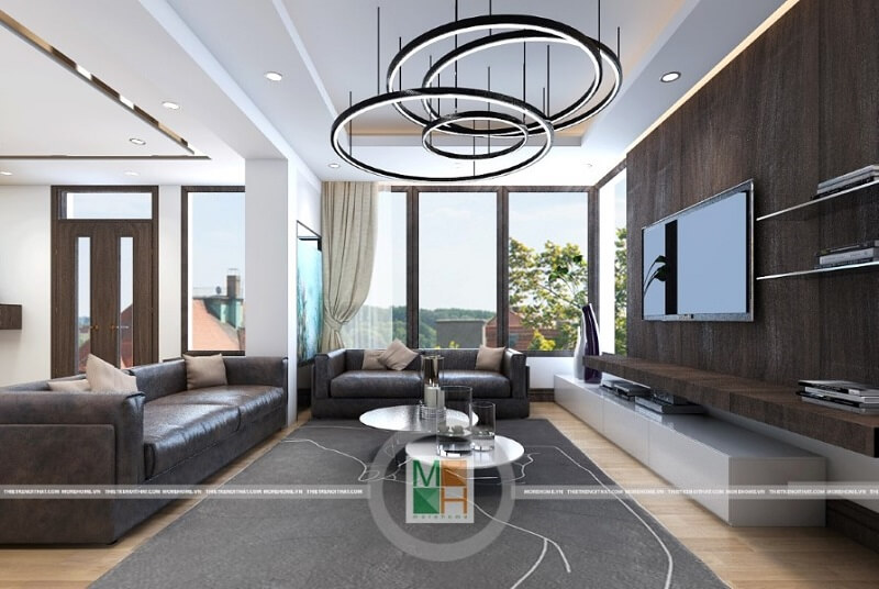 Mẫu thiết kế phòng khách chung cư đẹp với bộ sofa bọc da cao cấp tạo điểm nhấn nổi bật cho căn phòng