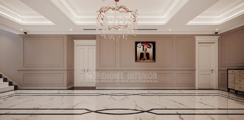Thiết kế hành lang đẹp ấn tượng với họa tiết độc đáo từ sàn lát đá cùng đường chỉ tường ấn tượng, bức tranh điểm nhấn kết hợp với nét tinh tế từ đèn trần cao cấp.